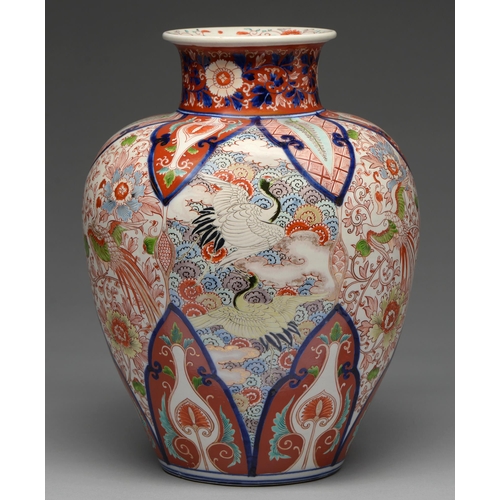 359 - An Imari vase, 19th / 20th c, enamelled with cranes and other birds between lappet borders, 41cm h... 