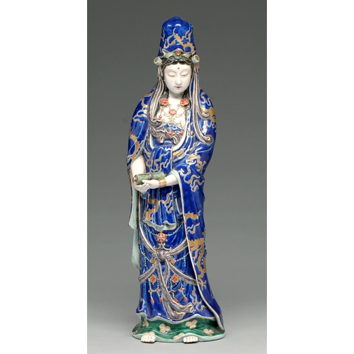 361 - A Japanese porcelain figure of Kannon, early 20th c, with turquoise lined blue robe with gilt dragon... 