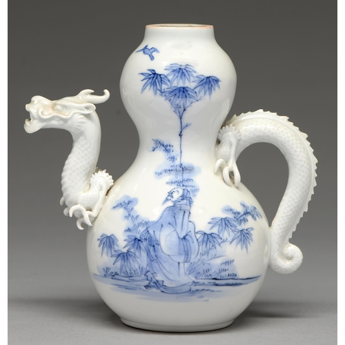 377 - An Hirado double gourd ewer, 20th c, with dragon spout and handle, painted in underglaze blue with a... 