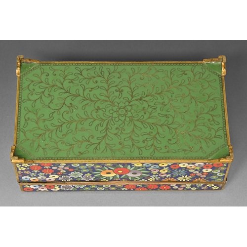 391 - A Japanese cloisonne enamel box, second quarter 20th c, enamelled with brighlty colourerd stylised f... 