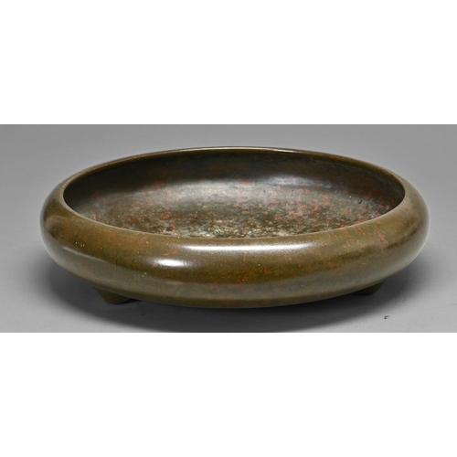 407 - A Japanese bronze flower arrangement  bowl, Meiji period, of shallow rounded form with inverted rim ... 