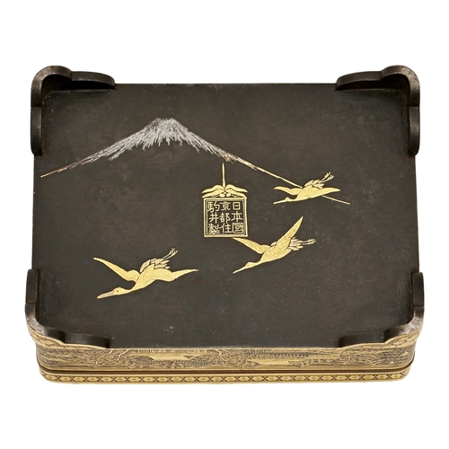 420 - A Japanese inlaid steel box and cover, Kyoto, Komai workshop, Meiji period, decorated in gold nunome... 