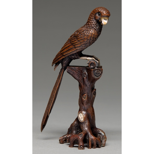 433 - A  bronze and mixed metals okimono of a parrot,   perched on a gnarled tree stump, 19.3cm h, engrave... 