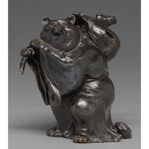 434 - A Japanese bronze anthropomorphic okimono of a badger/racoon dog (Tanuki) as a priest carrying a bel... 