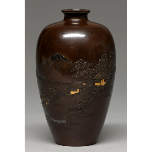 439 - A Japanese bronze vase, Meiji period, carved and inlaid in gold and shibuichi with a landscape, 16.5... 