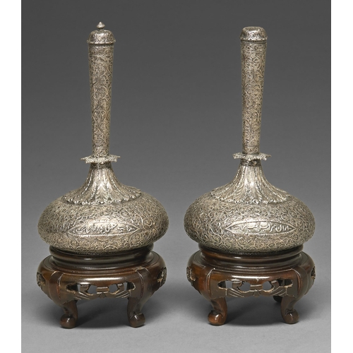 448 - Two Mughal silver flasks and stoppers, North India or Kashmir, 18th / early 19th c, with compressed ... 