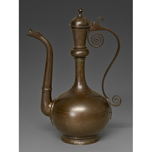 450 - An Indo Persian damascened ewer, aftaba, 18th / early 19th c, finely inlaid with floral motifs in go... 