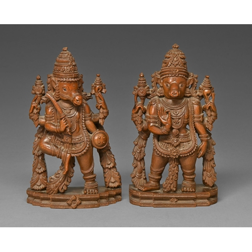 455 - A pair of Indian sandalwood carvings of Vishnu manifested as the avatars Varaha and Kalki, 19th c, t... 