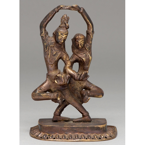 461 - An Indian bronze sculpture of Shiva and Parvati, 17.5cm h