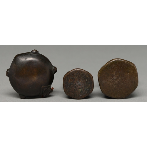 476 - A  bronze opium weight in the form of a hintha bird, Burma, 19th c, 62mm h, another, smaller and a t... 