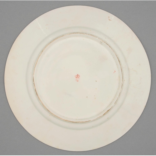 521 - A Derby plate, c1820, painted by Richard Dodson with three brightly plumaged birds reserved on a duc... 