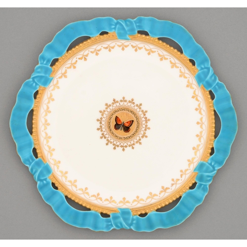 541 - A Brown-Westhead, Moore & Co ribbon bordered dessert plate, c1870, enamelled and gilt to the cen... 