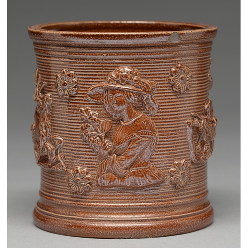 558 - A saltglazed brown stoneware tobacco jar, possibly Yorkshire, c1830, sprigged with a lady with flowe... 