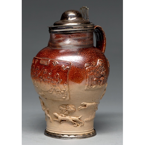 559 - A silver mounted Mortlake saltglazed brown stoneware hunting jug, c1790, the sprigged decoration inc... 