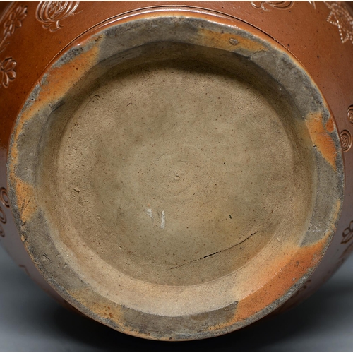 566 - A Derbyshire saltglazed brown stoneware jug, probably Chesterfield, dated 1831, incised on the flare... 