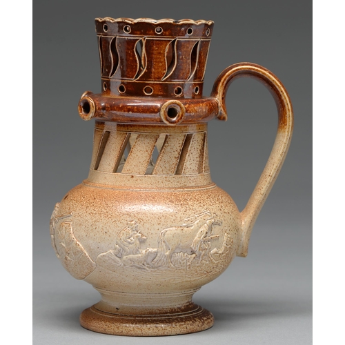 568 - A Derbyshire saltglazed brown stoneware puzzle jug, probably Chesterfield, c1830, with three sportin... 