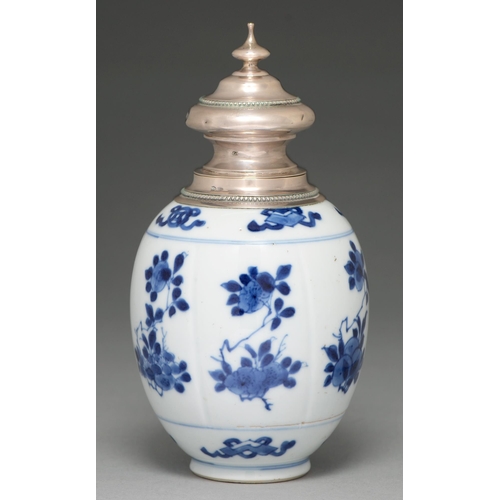 64 - A Chinese blue and white jar, 18th c, lobed oviform and painted with flowering plants, later silver ... 