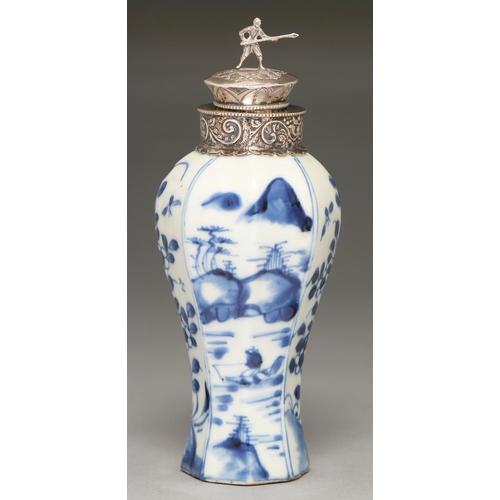 66 - A Chinese blue and white waisted octagonal vase, 18th / 19th c, painted in underglaze blue with rive... 