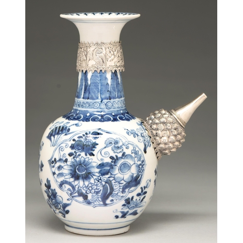 69 - A Chinese blue and white kendi, 19th c, with later silver mounts, painted with flowers in barbed res... 