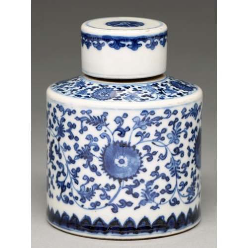 72 - A Chinese blue and white tea caddy and cover, 19th / 20th c, painted with lotus meander, 12.5cm h... 