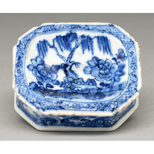 77 - A Chinese blue and white salt cellar, late 18th c, painted with peonies, tree and fence in panelled ... 