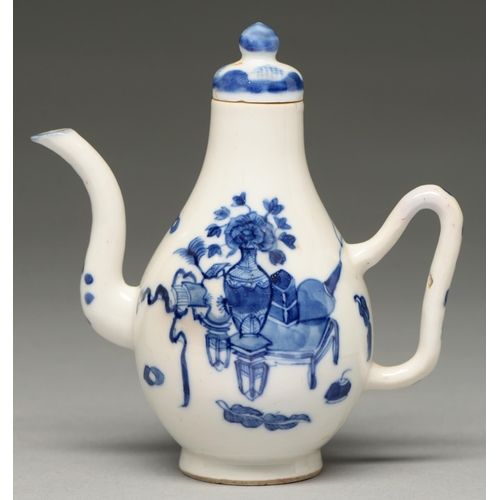 79 - A Chinese blue and white condiment jug and a cover, 18th c, painted to either side with auspicious o... 