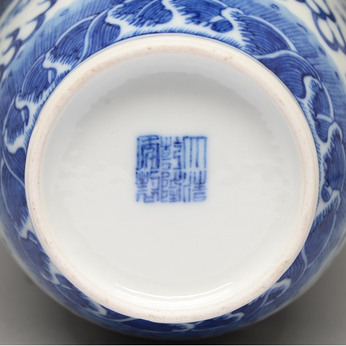 83 - A Chinese blue and white vase, 19th c or later, painted in the manner of 'heaping and piling' with f... 