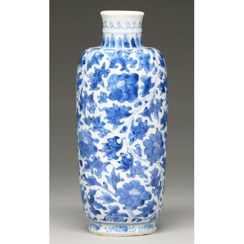 84 - A Chinese blue and white vase, 19th c, of shouldered cylindrical form and painted with lotus meander... 