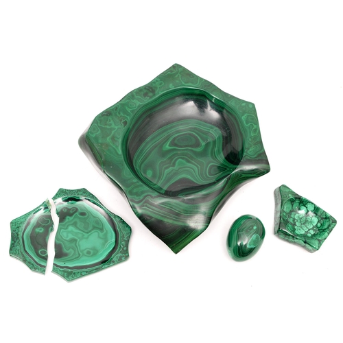 911 - Minerals. A substantial malachite ashtray and three other objects, ashtray 24cm diam... 