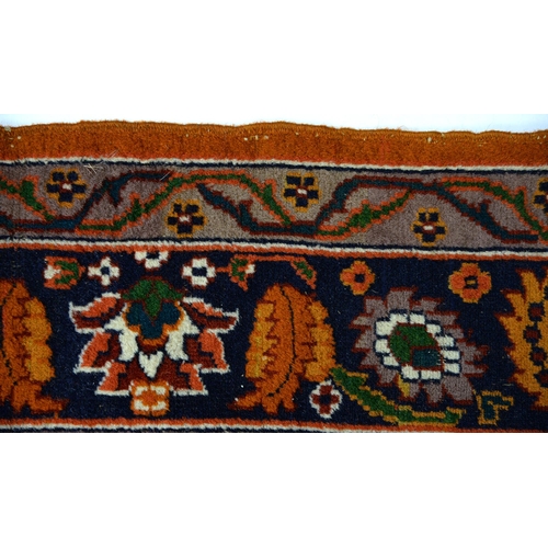 916 - An Indian rug, 126 x 199cm