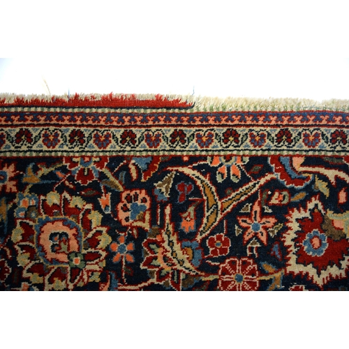 919 - A Kashan rug, 132 x 207cm