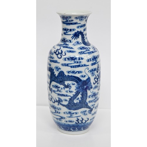 83 - A Chinese blue and white vase, 19th c or later, painted in the manner of 'heaping and piling' with f... 