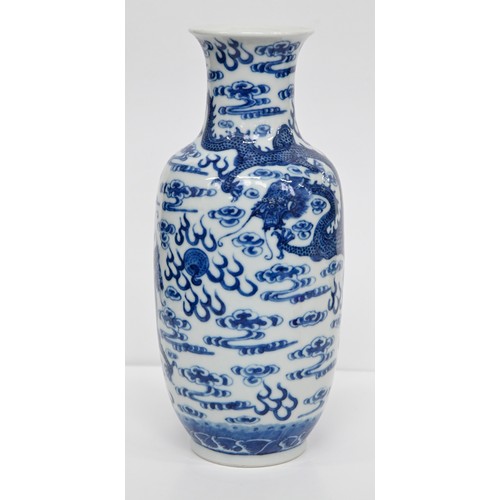 83 - A Chinese blue and white vase, 19th c or later, painted in the manner of 'heaping and piling' with f... 