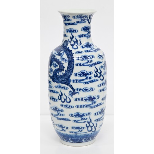 83 - A Chinese blue and white vase, 19th c or later, painted in the manner of 'heaping and piling' with f... 