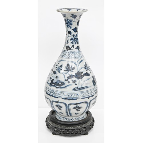 98 - A Chinese blue and white vase, Yuan dynasty, painted with waterfowl and plants between scroll and di... 