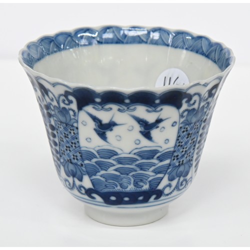 116 - A Chinese blue and white octagonal beaker, Kangxi period, painted in upright registers with flowerin... 