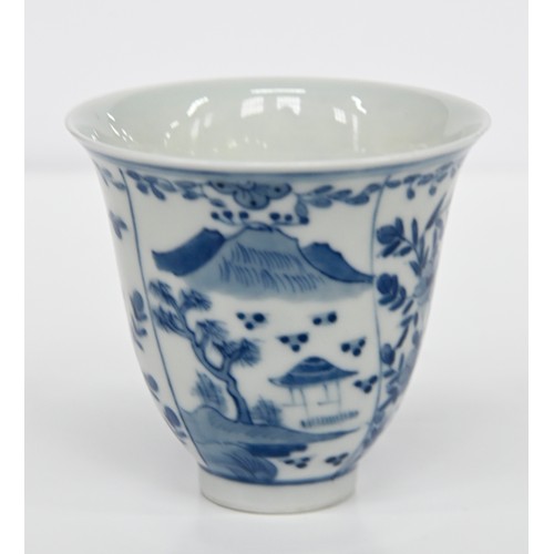 116 - A Chinese blue and white octagonal beaker, Kangxi period, painted in upright registers with flowerin... 