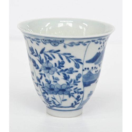 116 - A Chinese blue and white octagonal beaker, Kangxi period, painted in upright registers with flowerin... 