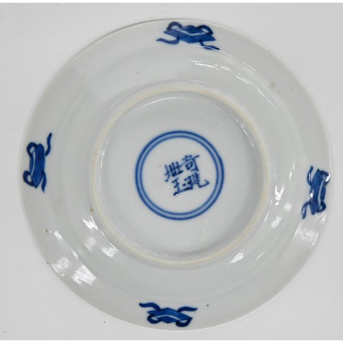 120 - A set of five Chinese blue and white miniature plates, 19th c, painted with a woman and child beneat... 