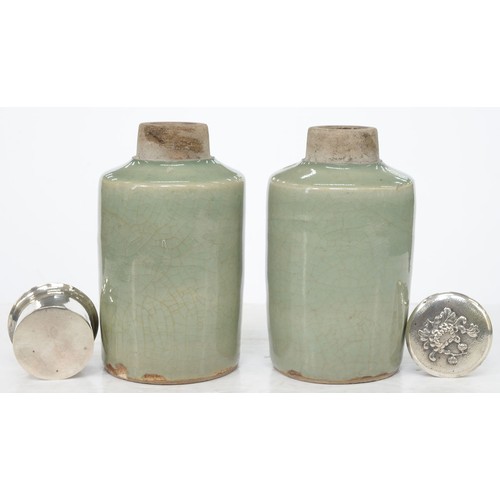 196 - Two Chinese celadon tea caddies, 19th c, the neck unglazed, associated silver coloured metal covers,... 