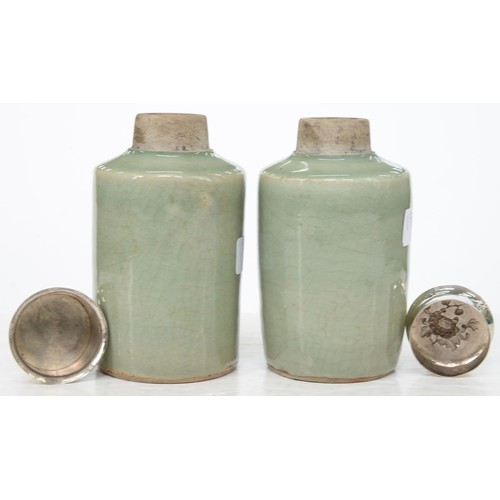 196 - Two Chinese celadon tea caddies, 19th c, the neck unglazed, associated silver coloured metal covers,... 