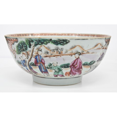 218 - A Chinese famille rose bowl, c1770, painted with two groups of figures by water in a mountainous lan... 