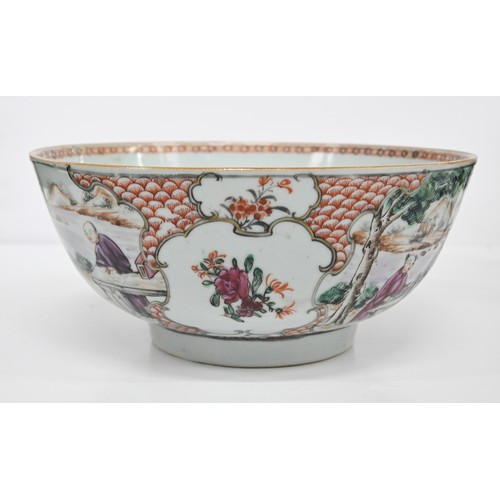 218 - A Chinese famille rose bowl, c1770, painted with two groups of figures by water in a mountainous lan... 