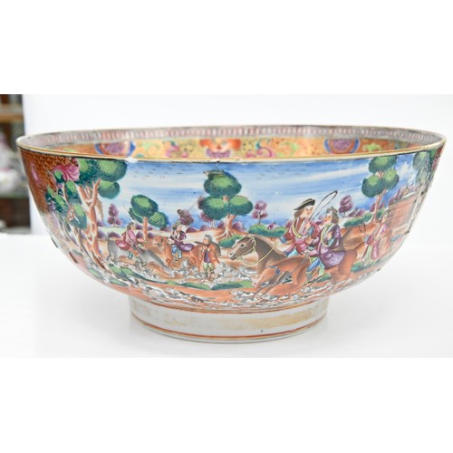 232 - A Chinese European-subject famille rose punch bowl, c1770, enamelled with hunting scenes and subsidi... 