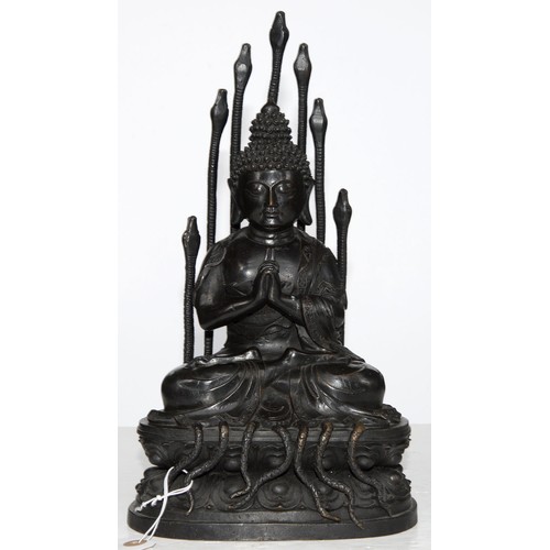 323 - A Tibetan bronze figure of Buddha Nagaraja, 18th c, seated in dhyanasana, the hands clasped in Uttar... 