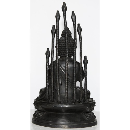 323 - A Tibetan bronze figure of Buddha Nagaraja, 18th c, seated in dhyanasana, the hands clasped in Uttar... 