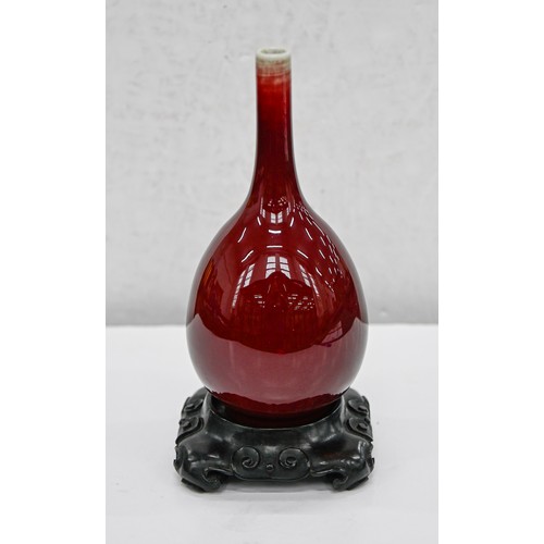 192 - A Chinese flambe glazed vase, 20th c, of slender bulbous form, the glaze thinning slightly at the ne... 