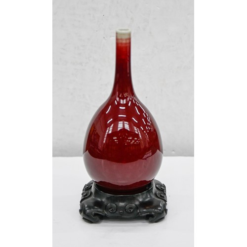 192 - A Chinese flambe glazed vase, 20th c, of slender bulbous form, the glaze thinning slightly at the ne... 