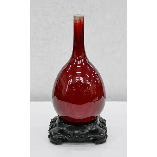 192 - A Chinese flambe glazed vase, 20th c, of slender bulbous form, the glaze thinning slightly at the ne... 