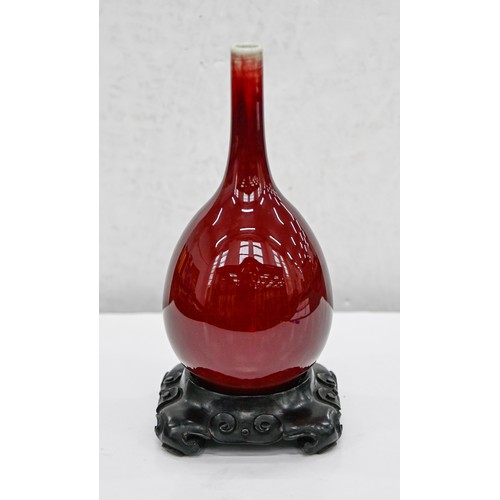 192 - A Chinese flambe glazed vase, 20th c, of slender bulbous form, the glaze thinning slightly at the ne... 